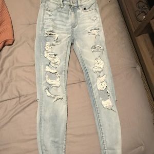 High waisted distressed skinny jean